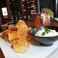 Housemade French Onion Dip · Caramelized onions, garlic , and house made chips.