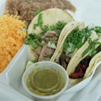3 Taco Plate · Any 3 tacos of choice with rice and beans.