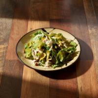 Arugula Pear Salad · Baby arugula, pears, shaved fennel, goat cheese and caramelized pecans tossed with our lemon...