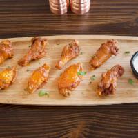 ALL NATURAL NO GMO 8pc Chicken Wings · 8 pieces fried wings and includes a choice of dip.