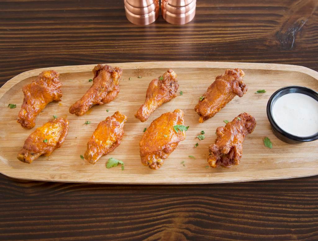 ALL NATURAL NO GMO 8pc Chicken Wings · 8 pieces fried wings and includes a choice of dip.