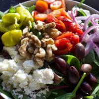 Greek Salad · Lettuce, Kalamata olives, roasted red peppers, tomato, red onion, walnuts, feta cheese, pepe...