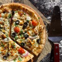 Greek Gyro Pizza · Garlic herb butter, gyro, feta, oregano, mozzarella, cherry tomato, red onion, fresh parsley.