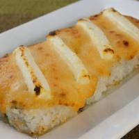 Goyemon- Style Lasagna Roll · Scallop yum and cucumber spread with yum yum sauce and cream cheese