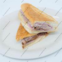 Pernil Sandwich · Pork roast. 
