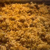 Moro de Habichuleas Rojas · Red beans mixed with rice. 