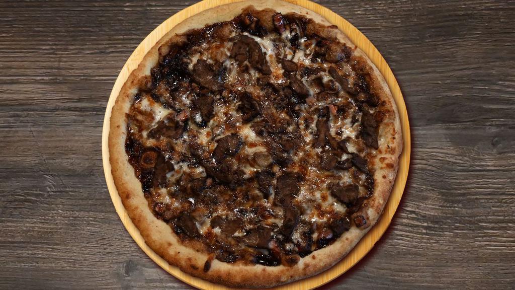 The Philly Pizza · Balsamic onions glaze, shredded mozzarella and steak.