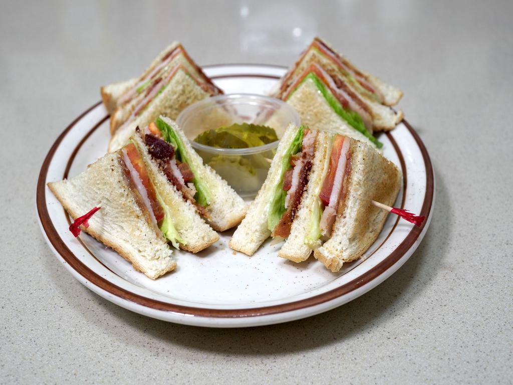 Club Sandwich · Triple-decker of turkey, bacon, lettuce and tomato on toast with mayonnaise.