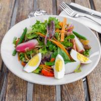 Classic Nicoise Salad · Haricot vert, black olives, potatoes, boiled egg, anchovies and pan-seared tuna.