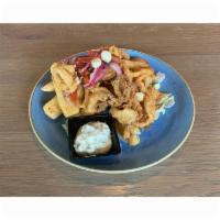 Jalea · Fried calamari, shrimp, fish, yuca, choclo, salsa criolla, homemade tartar sauce
