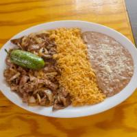 4. Steak and Onions · Steak and onions with rice and beans. Comes with corn tortillas.