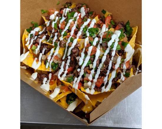 Small Jefe Nachos · Tortilla chips loaded with cheese, your choice of protein, pico de gallo, salsa, avocado sauce, jalapenos, and sour cream.