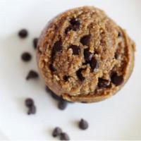 Vegan Cookie Dough Bite · One cookie dough bite made with oat flour, vegan chocolate chips, MCT oil, vanilla & agave n...