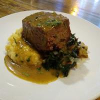 Meatloaf · sautéed kale & bacon, garlic mashed potatoes & onion gravy
