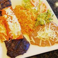 Tampiquena Dinner · Skirt steak, rice, beans, guacamole, cheese enchilada and a side of tortillas.