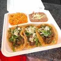 3 Taco Dinner · A choice of meat served with rice, beans, lettuce and tomato.