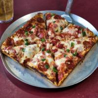 Classic Supreme Pizza · Spicy pepperoni, ham, green pepper and Spanish onion over pizza sauce with our house cheese ...