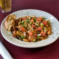Jambalaya Pasta · Grilled chicken breast with spicy sausage, shrimp and peppers and onions in a spicy Cajun to...