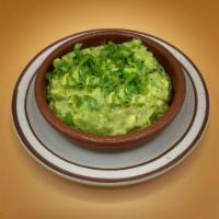House Guac · Avocado, serrano pepper, lime, onion and cilantro. Served with tortilla chips.