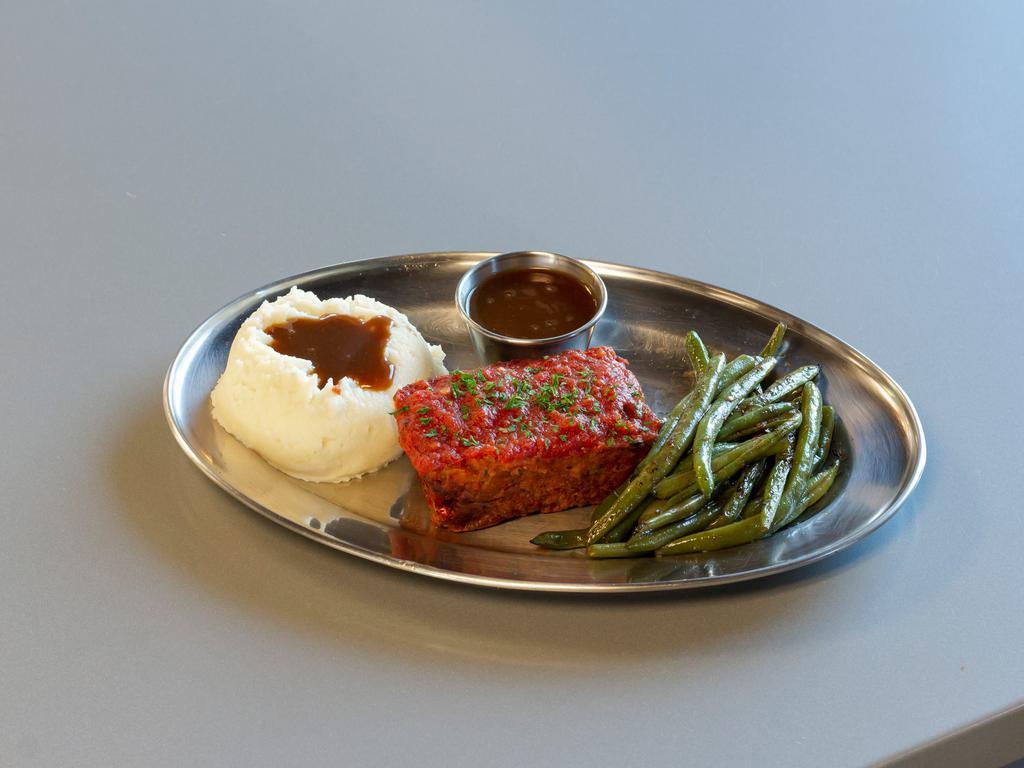 Meatloaf · Impossible soy special sauce, mashed potatoes, vegetables & garlic bread.   Add salad for an additional charge. Soy.