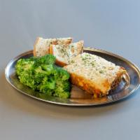 Shepard Pie · Meatless Crumbles, Mixed Veg., Vegan Cheese, with a layer of Mashed Potatoes, Broccoli & Gar...