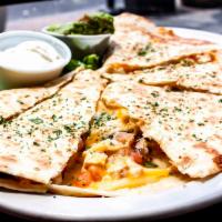 Chicken Quesadilla · Tortilla stuffed with grilled or blackened chicken, cheese and pico de gallo. Sour cream and...