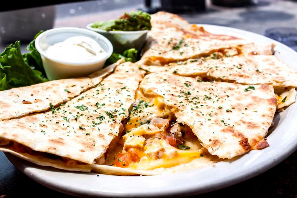 Chicken Quesadilla · Tortilla stuffed with grilled or blackened chicken, cheese and pico de gallo. Sour cream and  guacamole on the side.