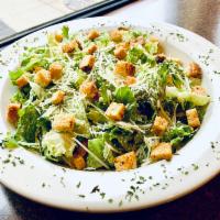 Caesar Salad · Leafy greens tossed in Caesar dressing with fresh Parmesan and croutons. Add grilled or blac...