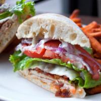 Pesto Chicken Sandwich · Grilled chicken breast with bacon, jack cheese, lettuce, tomato, red onion and pesto mayo. S...