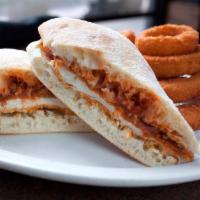 Chicken Parmesan Sandwich · Chicken breast with Italian breading topped with marinara sauce and Parmesan cheese. Spicy b...