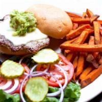 Turkey Burger · Wood-grilled turkey patty topped with melted jack cheese and guacamole, plus lettuce, tomato...