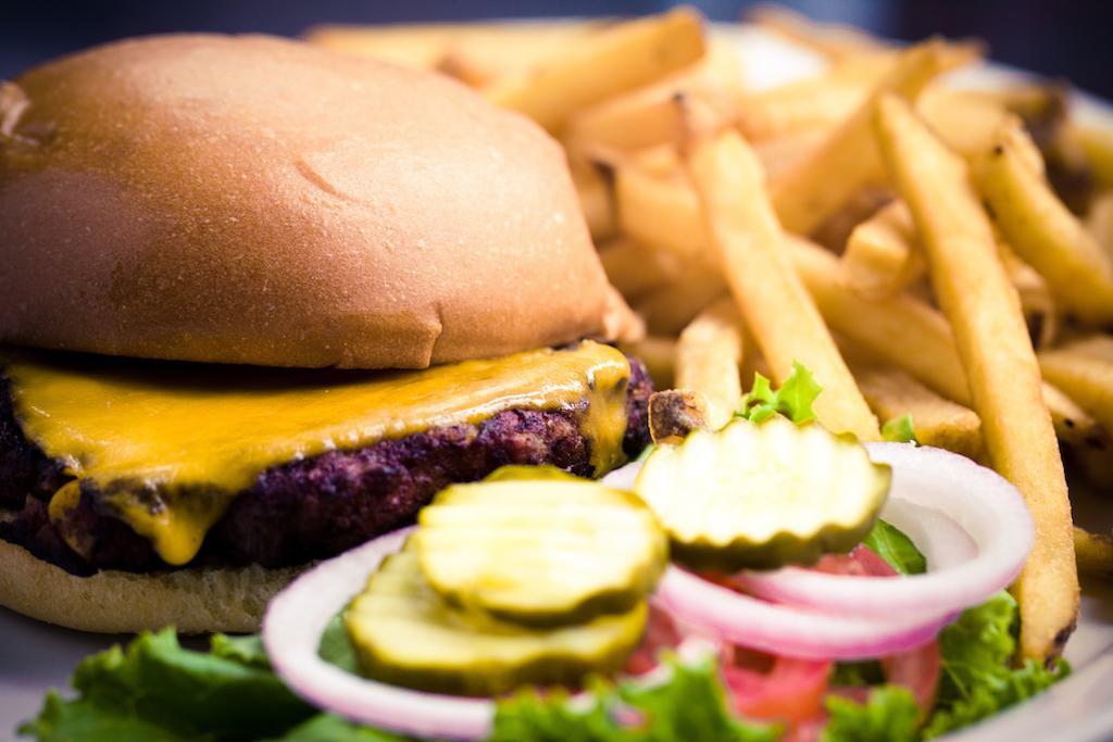 Veggie Burger · A chipotle black bean patty served with cheddar cheese and pesto mayo, plus lettuce, tomato, red onions and pickles on the side. Served with fries.