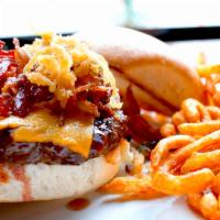 Texas Burger · Your choice of patty smothered in house-made BBQ sauce topped with bacon, cheddar and fried ...