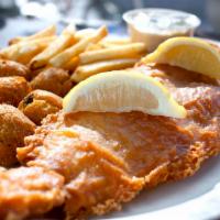 Fish and Chips · Texas-sized beer-battered haddock plank served with tartar sauce and fries.