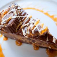 Chocolate Peanut Butter Pie · Peanut butter mousse and milk chocolate on a chocolate cookie crust. Topped with chocolate, ...
