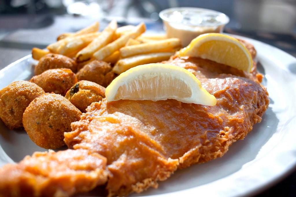 Fish Basket · Texas Style! Texas Sized! Beer-battered haddock deep-fried. Served with fries and tartar sauce.