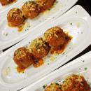 Nino’s Homemade Meatballs · Breaded and sauteed in anchovy sauce with pine nuts, raisins, roasted tomato sauce, and grat...