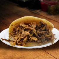 Arepa Mixto · Includes beef and chicken.