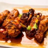 BBQ Wings · Delicious chicken wings seasoned in a special blend of spices then grilled.