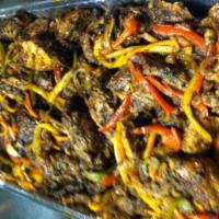 Spicy Jerk Chicken (Bone-in) · Prepared traditionally (bone-in), chicken is marinated in our signature blend of spicy Jamai...