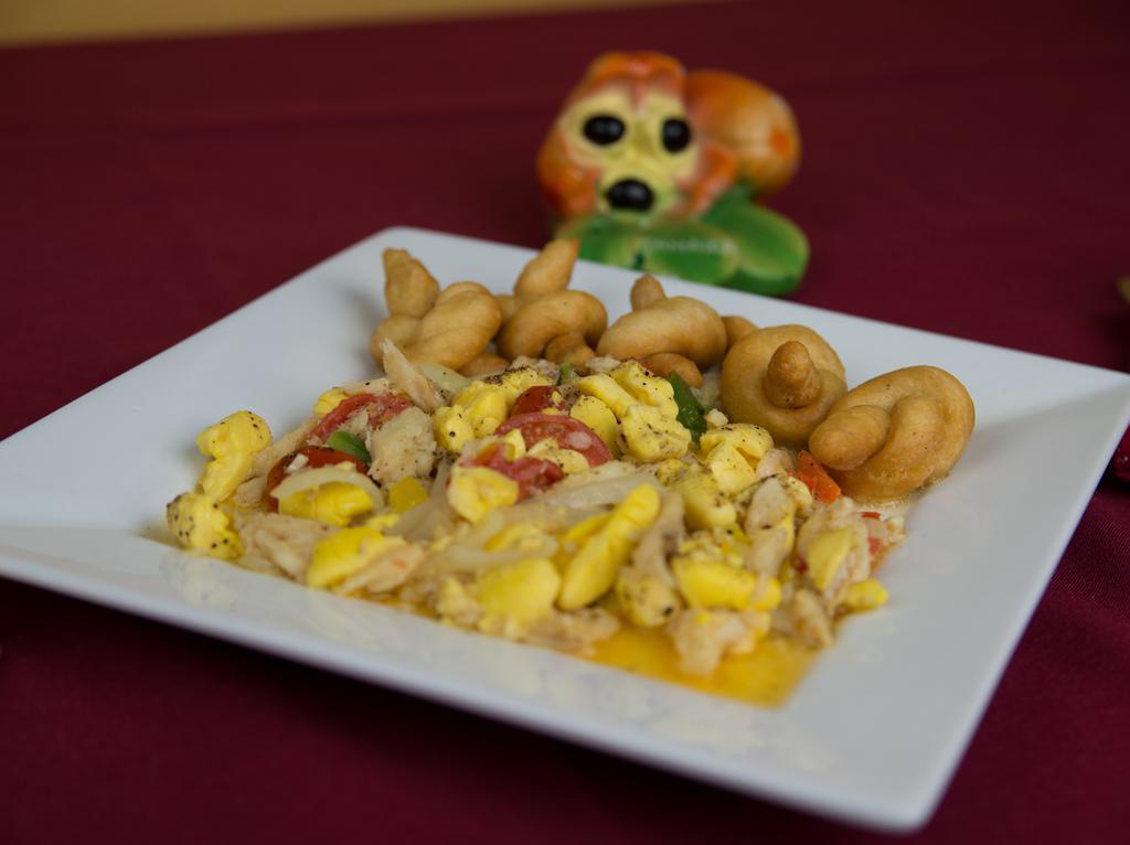 Vegetarian Ackee Saute · Delicate Jamaican ackee sauteed in a mix of olive oil, onions, garlic, tomatoes and peppers for a tasty main course. Gluten free.
