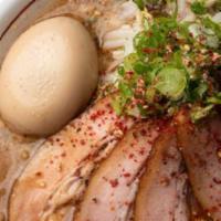 Cha Cha Cha Ramen  ·  Pork and fish broth: pork chashu, seasoned egg, bean sprouts, chopped onion, green onion, g...