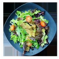House salad · Baby mixed greens and cherry tomatoes topped with our original house japanese dressing.
