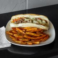 Christa's Philly Cheese Steak · Choose beef or chicken, sauteed onions, peppers and provolone cheese on a soft hoagie bun. S...