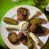 Istanbul Sampler · Includes 3 pieces of cheese rolls, 3 pieces of falafel, 3 pieces of stuffed grape leaves, an...
