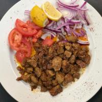 Beef Liver · Sautéed beef liver and special seasoning served with onions, tomatoes, and lemon.