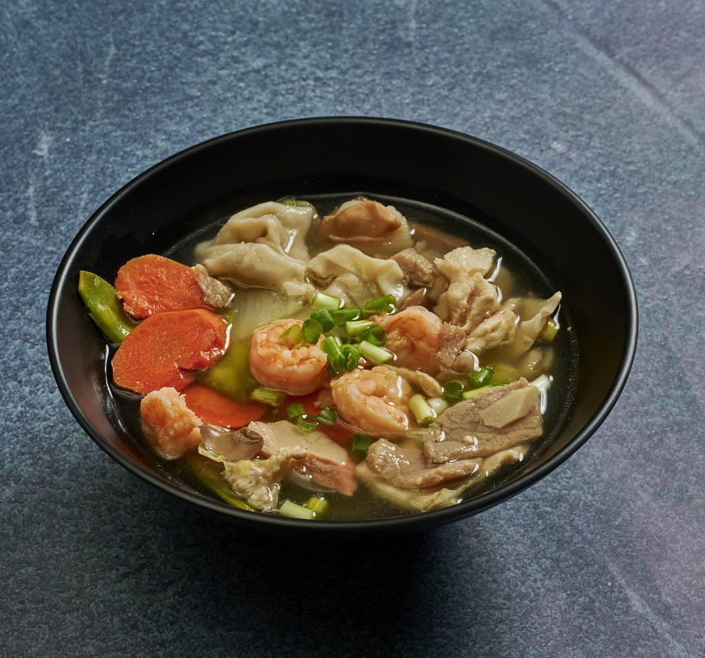 Warr Wonton Soup · Pork wontons, shrimp, beef, chicken, napa cabbage, mushrooms, snow peas, bamboo shoots, water chestnuts, carrots and thinly sliced barbecued pork in a light chicken broth.