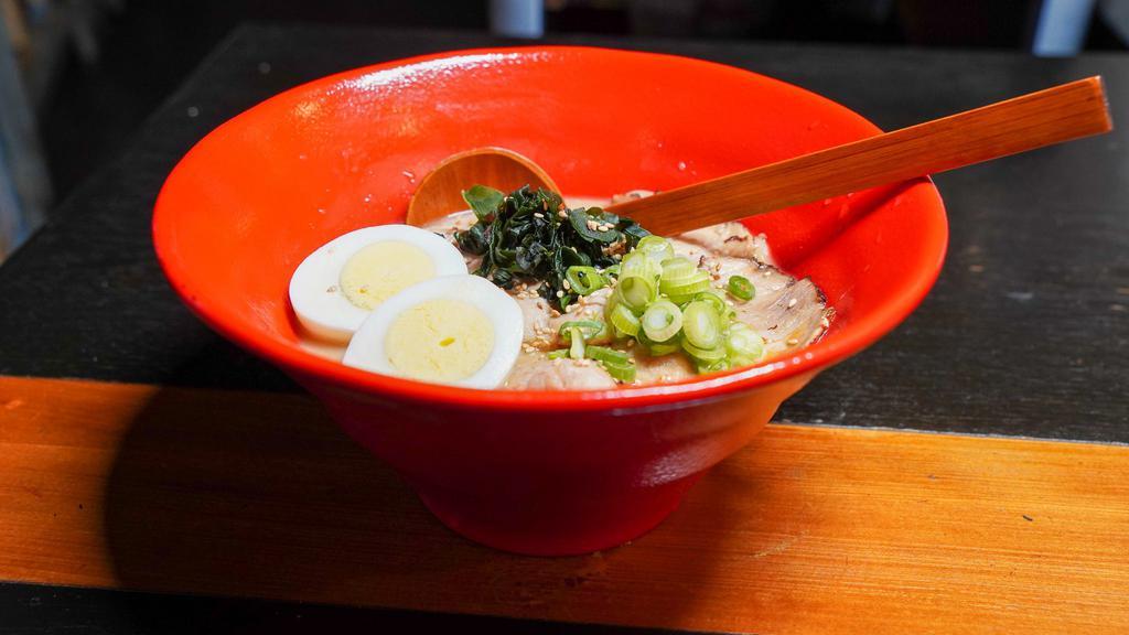 Tonkotsu Ramen · Egg Noodle, Chashu Pork 6pcs, Boiled Egg 1pc ,
Wakame, Green onion, Tonkotsu Soup.