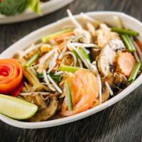 22. Pad Woon Sen | Clear Glass Noodles · Glass noodles, eggs, baby corn, mushroom, carrots, white onions, tomatoes, bean sprouts, gre...