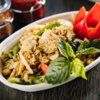 25. Basil Fried Rice · Egg, bamboo shoots, baby corn, mushrooms, bell peppers, white onions, basil, garlic.